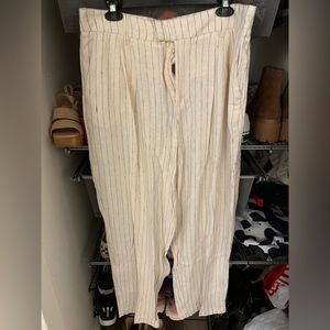 White linen pin stripe pants, high waisted and flowy. Never worn!